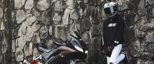 Preview wallpaper motorcycle, motorcyclist, helmet, bike, wall