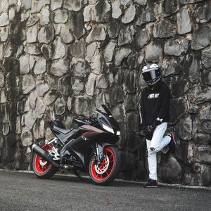 Preview wallpaper motorcycle, motorcyclist, helmet, bike, wall