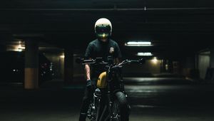 Preview wallpaper motorcycle, motorcyclist, helmet, bike, parking