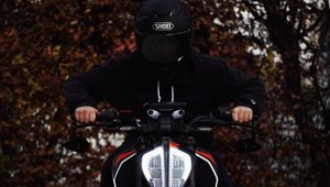 Preview wallpaper motorcycle, motorcyclist, helmet, bike, black
