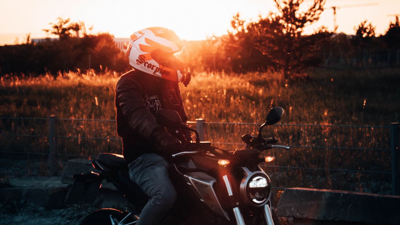 Wallpaper motorcycle, motorcyclist, helmet, sunset, light