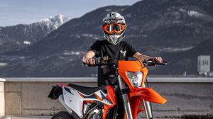 Preview wallpaper motorcycle, motorcyclist, helmet, bike, orange