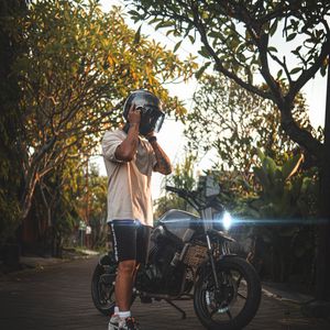 Preview wallpaper motorcycle, motorcyclist, helmet, bike, gray