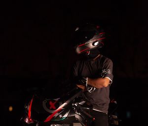 Preview wallpaper motorcycle, motorcyclist, helmet, darkness