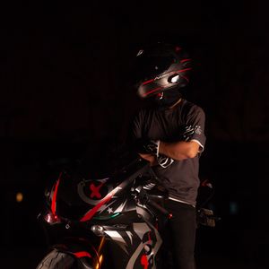 Preview wallpaper motorcycle, motorcyclist, helmet, darkness