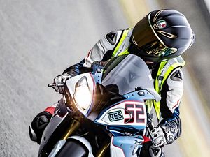 Preview wallpaper motorcycle, motorcyclist, helmet, track, moto