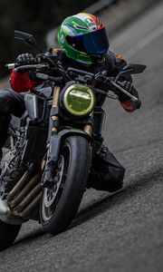 Preview wallpaper motorcycle, motorcyclist, helmet, motorcycle racing, tilt