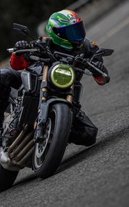 Preview wallpaper motorcycle, motorcyclist, helmet, motorcycle racing, tilt