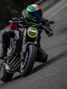 Preview wallpaper motorcycle, motorcyclist, helmet, motorcycle racing, tilt