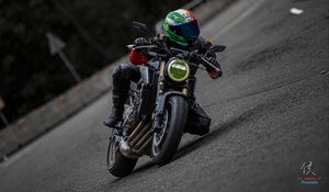Preview wallpaper motorcycle, motorcyclist, helmet, motorcycle racing, tilt
