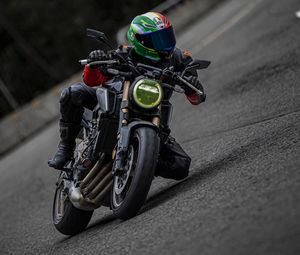 Preview wallpaper motorcycle, motorcyclist, helmet, motorcycle racing, tilt