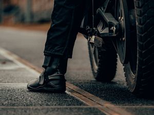 Preview wallpaper motorcycle, motorcyclist, leg, bike, black
