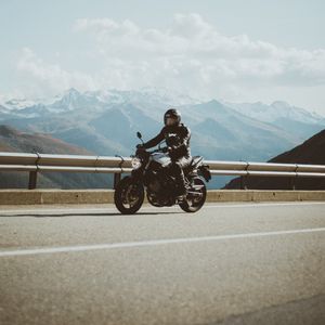 Preview wallpaper motorcycle, motorcyclist, road, mountains