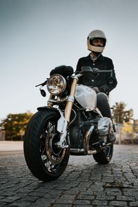 Preview wallpaper motorcycle, motorcyclist, side view, helmet