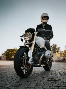 Preview wallpaper motorcycle, motorcyclist, side view, helmet