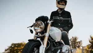 Preview wallpaper motorcycle, motorcyclist, side view, helmet