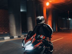 Preview wallpaper motorcycle, motorcyclist, speed, tunnel, road