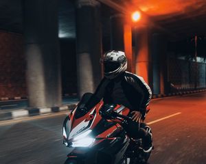 Preview wallpaper motorcycle, motorcyclist, speed, tunnel, road