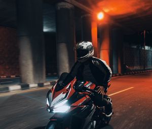Preview wallpaper motorcycle, motorcyclist, speed, tunnel, road