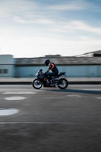 Preview wallpaper motorcycle, motorcyclist, speed, road