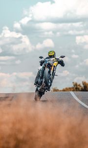 Preview wallpaper motorcycle, motorcyclist, stunt, bike, road