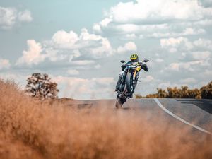 Preview wallpaper motorcycle, motorcyclist, stunt, bike, road