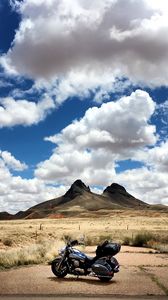 Preview wallpaper motorcycle, mountains, desert, clouds, travel