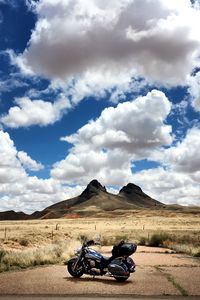 Preview wallpaper motorcycle, mountains, desert, clouds, travel