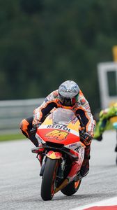 Preview wallpaper motorcycle, orange, motorcyclist, track, race, moto