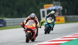 Preview wallpaper motorcycle, orange, motorcyclist, track, race, moto