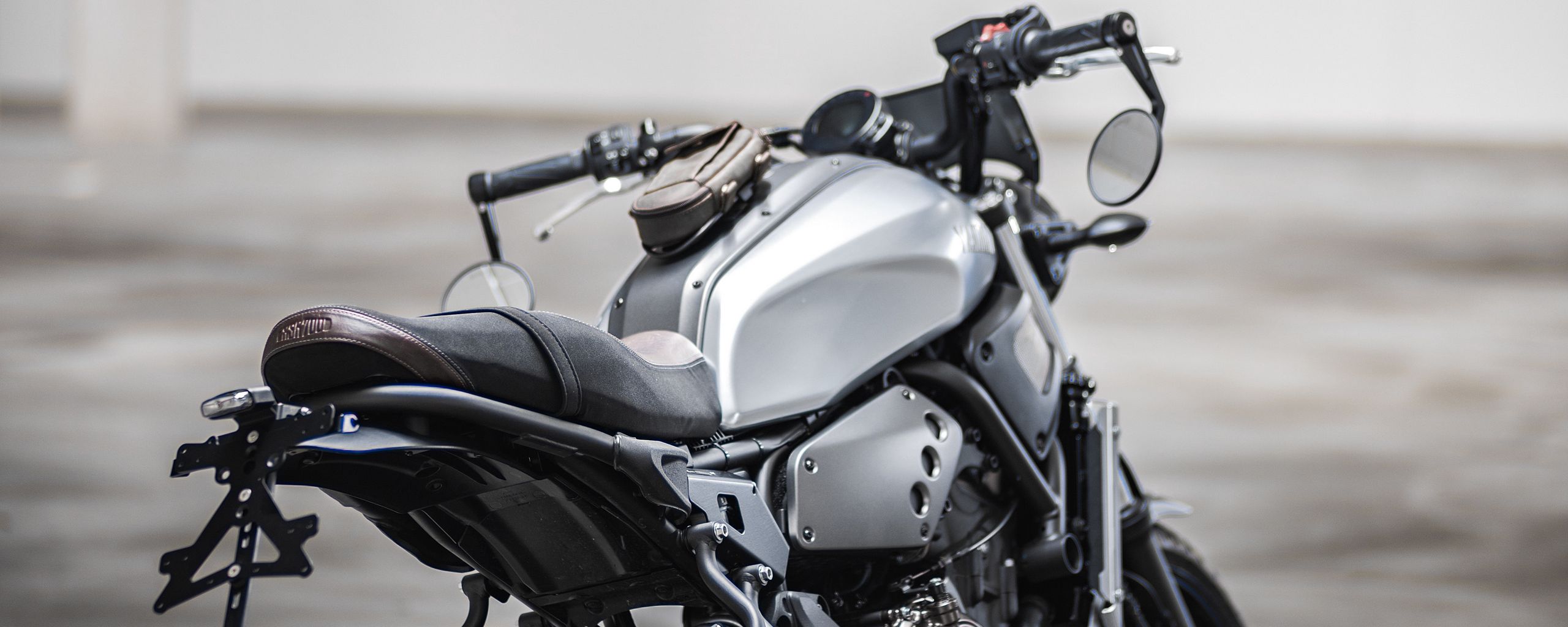 Download wallpaper 2560x1024 motorcycle, rear view, wheels, gray ...