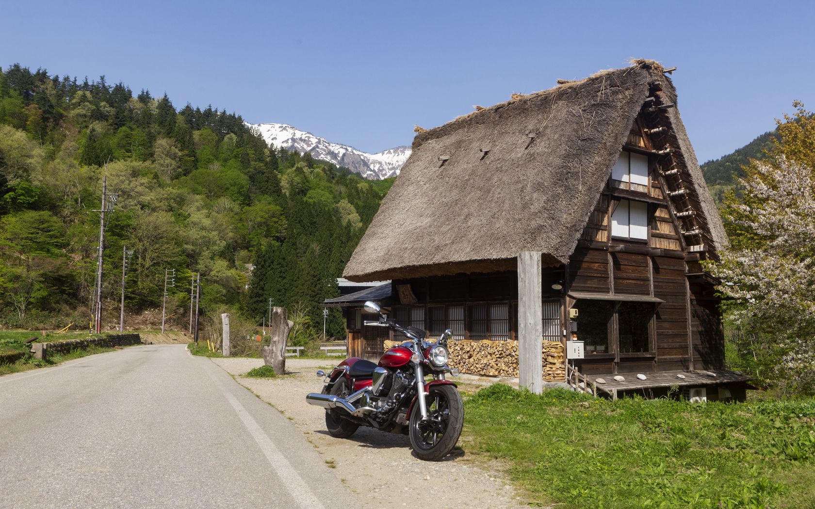 1680x1050 Wallpaper motorcycle, red, house, trees, mountain
