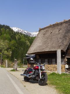 240x320 Wallpaper motorcycle, red, house, trees, mountain