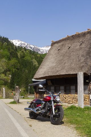 320x480 Wallpaper motorcycle, red, house, trees, mountain
