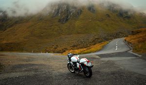 Preview wallpaper motorcycle, road, mountains