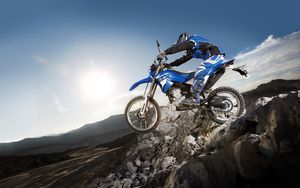 Preview wallpaper motorcycle, stones, extreme, yamaha, dark blue