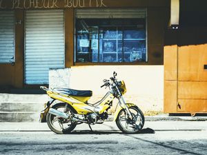 Preview wallpaper motorcycle, street, yellow