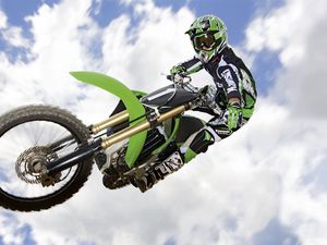 Preview wallpaper motorcycle, trick, jump, extreme, sky, clouds