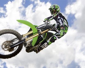 Preview wallpaper motorcycle, trick, jump, extreme, sky, clouds