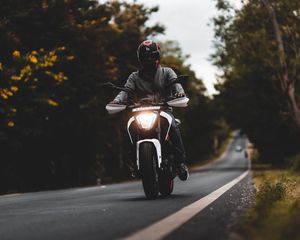 Preview wallpaper motorcycle, white, motorcyclist, road, trees