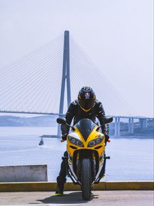 Preview wallpaper motorcycle, yellow, motorcyclist, helmet, bridge