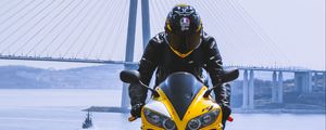 Preview wallpaper motorcycle, yellow, motorcyclist, helmet, bridge