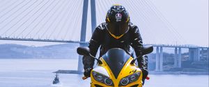 Preview wallpaper motorcycle, yellow, motorcyclist, helmet, bridge