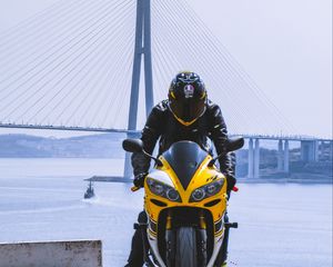 Preview wallpaper motorcycle, yellow, motorcyclist, helmet, bridge