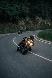 Preview wallpaper motorcycles, motorcyclist, helmet, pursuit, road