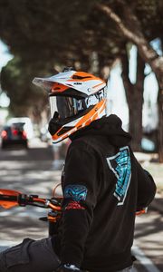 Preview wallpaper motorcyclist, helmet, motorcycle, equipment, hoodie