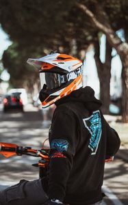 Preview wallpaper motorcyclist, helmet, motorcycle, equipment, hoodie