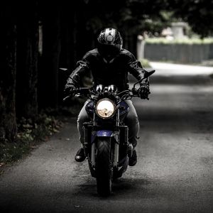 Preview wallpaper motorcyclist, motorcycle, biker, helmet, movement