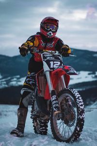 Preview wallpaper motorcyclist, motorcycle, cross, snow, winter