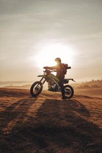 Preview wallpaper motorcyclist, motorcycle, dawn, indonesia